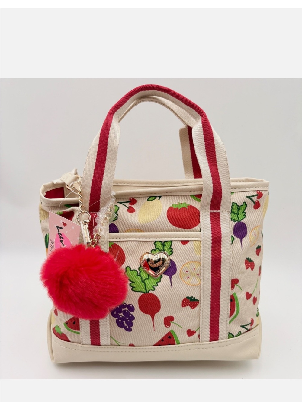 Cream Fruit-Print Tote with Red Stripe Handles and Red Pom Charm